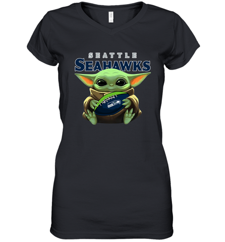 Baby Yoda Loves The Seattle Seahawks Star Wars Baby Yoda Hugs Seahawks NFL Womens V-Neck T-Shirt Womens V-Neck T-Shirt / Black / S Womens V-Neck T-Shirt - VeigarTee