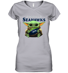 Baby Yoda Loves The Seattle Seahawks Star Wars Baby Yoda Hugs Seahawks NFL Womens V-Neck T-Shirt Womens V-Neck T-Shirt - VeigarTee
