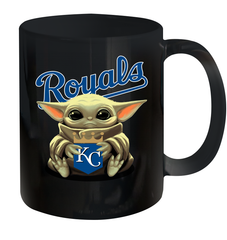 Baby Yoda Hugs Loves The Kansas City Royals Baseball Ceramic Mug 11oz Ceramic Mug 11oz - VeigarTee