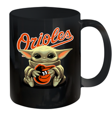 Baby Yoda Hugs Loves The Baltimore Orioles Baseball Ceramic Mug 11oz Ceramic Mug 11oz - VeigarTee