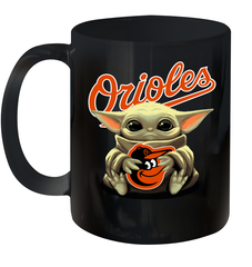 Baby Yoda Hugs Loves The Baltimore Orioles Baseball Ceramic Mug 11oz Ceramic Mug 11oz - VeigarTee