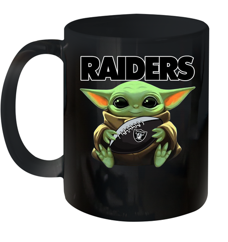 Baby Yoda Loves The Oakland Raiders Star Wars Baby Yoda Hugs Raiders NFL Ceramic Mug 11oz Ceramic Mug 11oz / Black / 11oz Ceramic Mug 11oz - VeigarTee