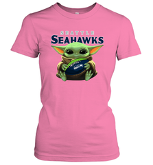 Baby Yoda Loves The Seattle Seahawks Star Wars Baby Yoda Hugs Seahawks NFL Womens T-Shirt Womens T-Shirt - VeigarTee