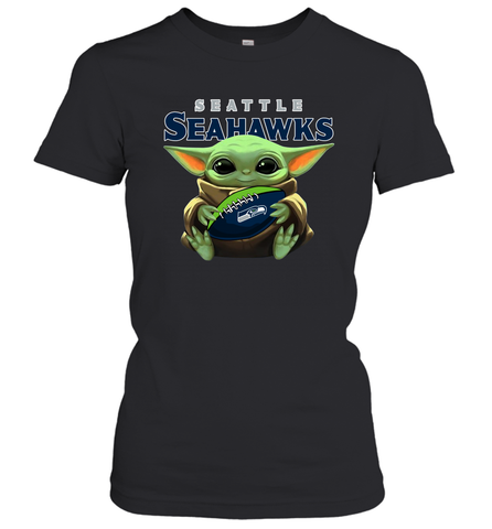 Baby Yoda Loves The Seattle Seahawks Star Wars Baby Yoda Hugs Seahawks NFL Womens T-Shirt Womens T-Shirt / Black / XS Womens T-Shirt - VeigarTee