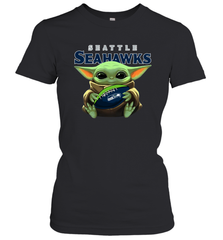 Baby Yoda Loves The Seattle Seahawks Star Wars Baby Yoda Hugs Seahawks NFL Womens T-Shirt Womens T-Shirt - VeigarTee