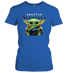Baby Yoda Loves The Seattle Seahawks Star Wars Baby Yoda Hugs Seahawks NFL Womens T-Shirt Womens T-Shirt - VeigarTee