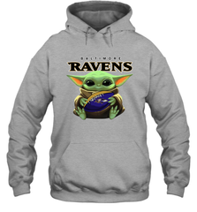 Baby Yoda Loves The Baltimore Ravens Star Wars Baby Yoda Hugs Ravens NFL Adult Hoodie Sweatshirt Adult Hoodie Sweatshirt - VeigarTee