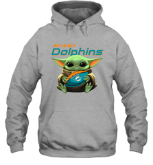 Baby Yoda Loves The Miami Dolphins Star Wars Baby Yoda Hugs Dolphins NFL Adult Hoodie Sweatshirt Adult Hoodie Sweatshirt - VeigarTee