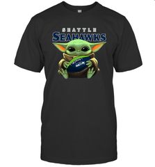 Baby Yoda Loves The Seattle Seahawks Star Wars Baby Yoda Hugs Seahawks NFL Mens T-Shirt Mens T-Shirt - VeigarTee
