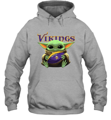 Baby Yoda Loves The Minnesota Vikings Star Wars Baby Yoda Hugs Vikings NFL Adult Hoodie Sweatshirt Adult Hoodie Sweatshirt - VeigarTee