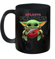 Baby Yoda Loves The Atlanta Falcons Star Wars Baby Yoda Hugs Falcons NFL Ceramic Mug 11oz Ceramic Mug 11oz - VeigarTee