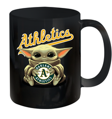 Baby Yoda Hugs Loves The Oakland Athletics Baseball Ceramic Mug 11oz Ceramic Mug 11oz - VeigarTee