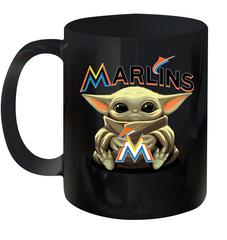 Baby Yoda Hugs Loves The Miami Marlins Baseball Ceramic Mug 11oz Ceramic Mug 11oz - VeigarTee