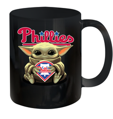 Baby Yoda Hugs Loves The Philadelphia Phillies Baseball Ceramic Mug 11oz Ceramic Mug 11oz - VeigarTee
