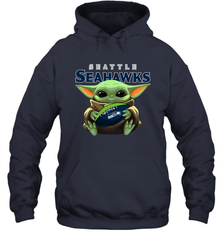 Baby Yoda Loves The Seattle Seahawks Star Wars Baby Yoda Hugs Seahawks NFL Adult Hoodie Sweatshirt Adult Hoodie Sweatshirt - VeigarTee