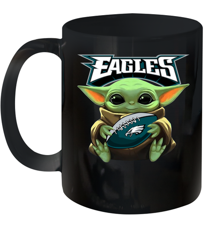 Baby Yoda Loves The Philadelphia Eagles Star Wars Baby Yoda Hugs Eagles NFL Ceramic Mug 11oz Ceramic Mug 11oz / Black / 11oz Ceramic Mug 11oz - VeigarTee