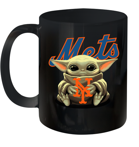 Baby Yoda Hugs Loves The New York Mets Baseball Ceramic Mug 11oz Ceramic Mug 11oz / Black / 11oz Ceramic Mug 11oz - VeigarTee