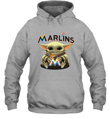 Baby Yoda Hugs Loves The Miami Marlins Baseball Adult Hoodie Sweatshirt Adult Hoodie Sweatshirt - VeigarTee