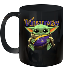 Baby Yoda Loves The Minnesota Vikings Star Wars Baby Yoda Hugs Vikings NFL Ceramic Mug 11oz Ceramic Mug 11oz - VeigarTee
